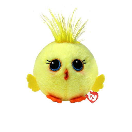 A yellow stuffed toy with large blue eyes, sitting upright against a soft background.
