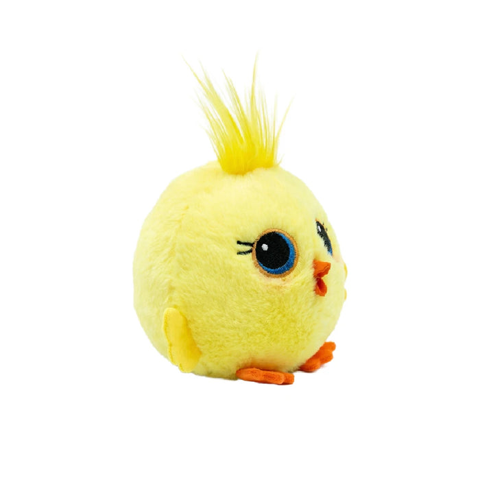 A plush yellow toy featuring oversized blue eyes, positioned on a neutral surface.
