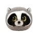 A stuffed raccoon with large eyes, set against a solid black background.