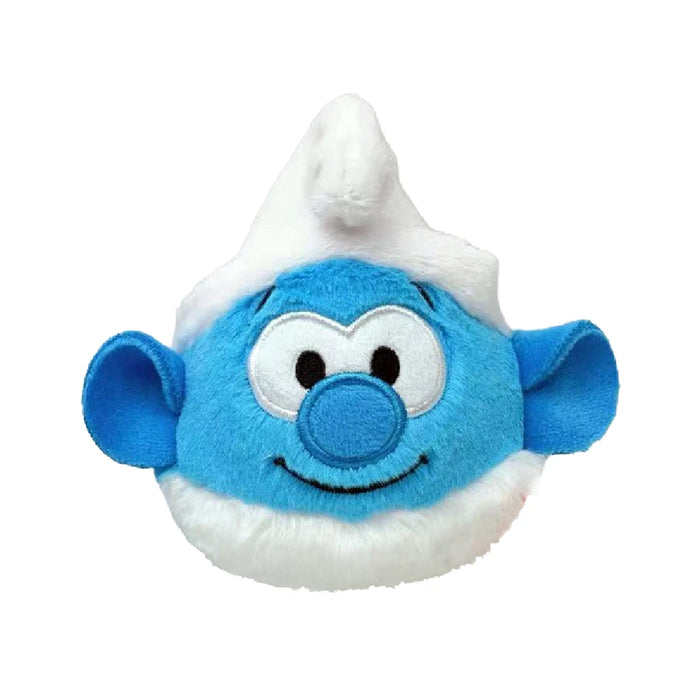 A plush toy of a Smurf with a blue nose and a white hat, showcasing its signature features in a soft, cuddly design.