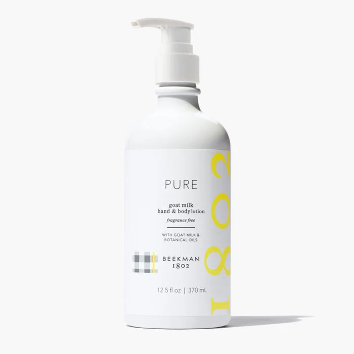  Pure conditioner in a clear bottle with a white pump, featuring a lemon design on the label.