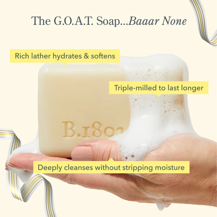 Bar of b-coo milk soap, featuring a creamy texture and minimalist packaging, ideal for gentle cleansing.