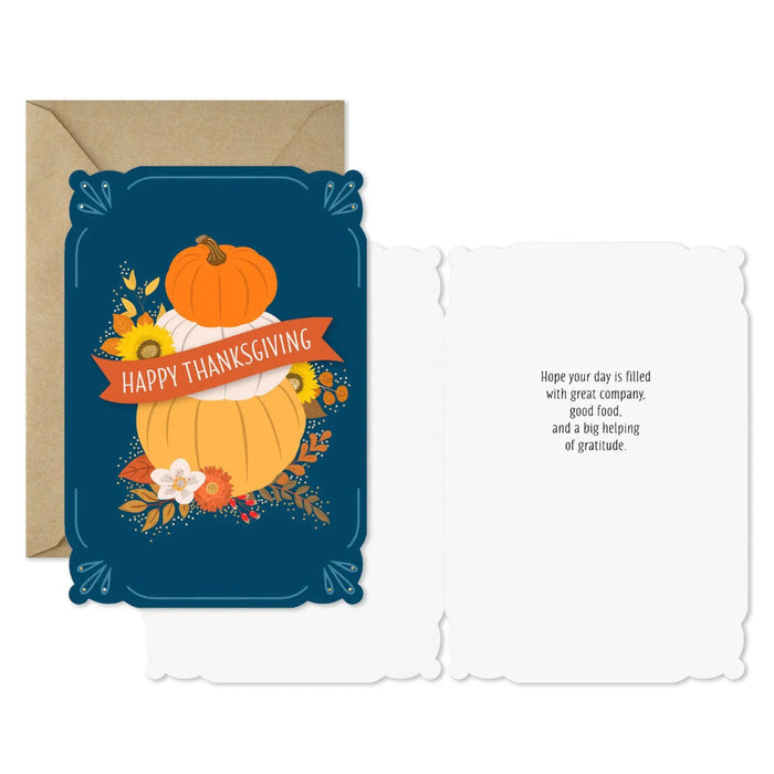 Premium Thanksgiving greeting card with blue background, pumpkins, and autumn leaves
