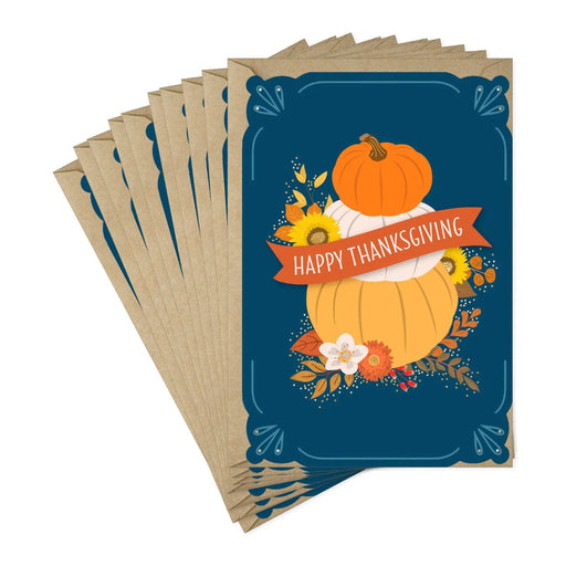 Premium Thanksgiving greeting card with blue background, pumpkins, and autumn leaves
