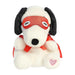 Stuffed dog wearing a red mask and holding a red heart, showcasing a playful and affectionate design.