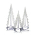 Simon Pearce Vermont Snowy Branches glass evergreen with frosted white branches, displayed beside glass pumpkins and lights.
