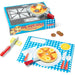 A tower of wooden blocks showcasing fruit and chocolate designs, stacked neatly on a plain background.