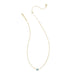 vibrant magnesite stone framed in polished gold-tone metal.