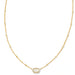 vibrant magnesite stone framed in polished gold-tone metal.