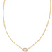 vibrant magnesite stone framed in polished gold-tone metal.