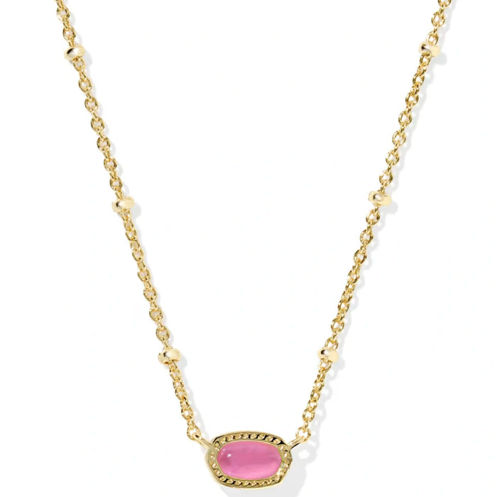 vibrant magnesite stone framed in polished gold-tone metal.