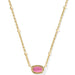 vibrant magnesite stone framed in polished gold-tone metal.