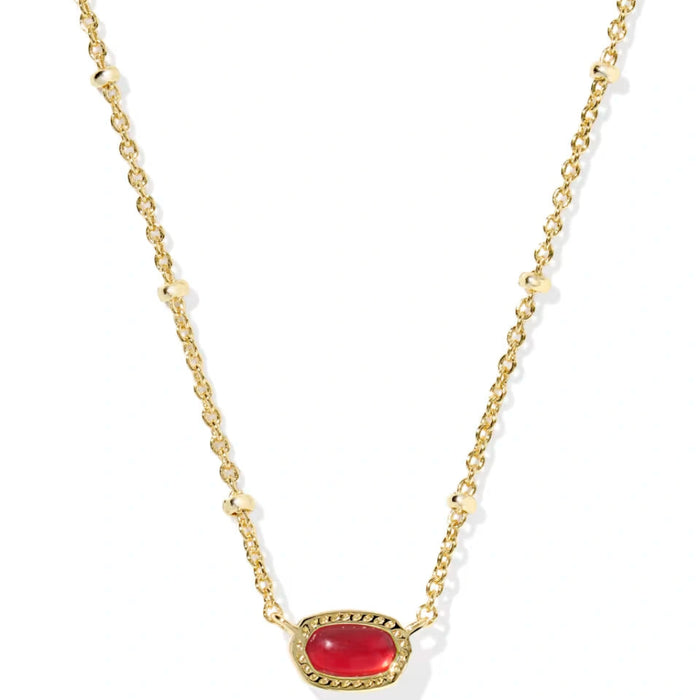vibrant magnesite stone framed in polished gold-tone metal.