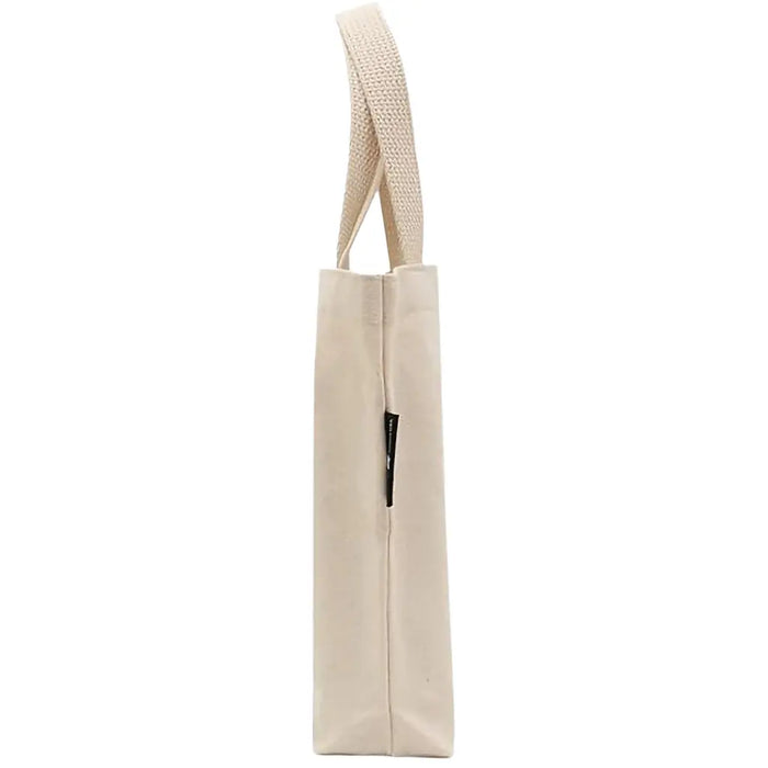 Carry your daily essentials with the Penguin Random House Bookworm Mini Tote Bag.