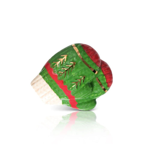 Decorative green and red object with gold accents on a white background