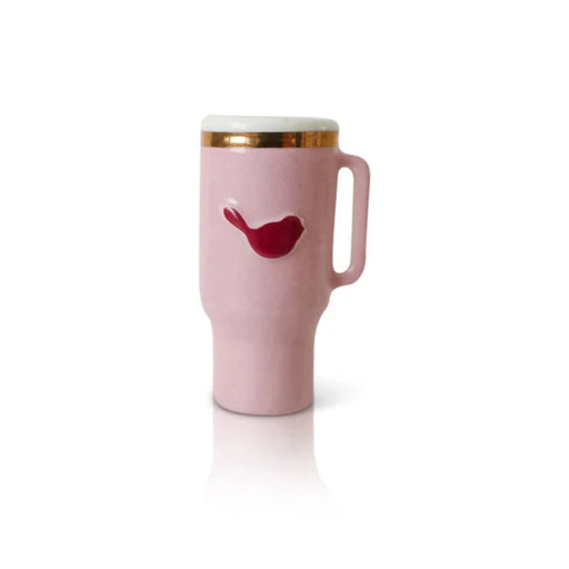 Nora Fleming Mini Pink travel mug with a red bird design on a white background