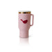Nora Fleming Mini Pink travel mug with a red bird design on a white background