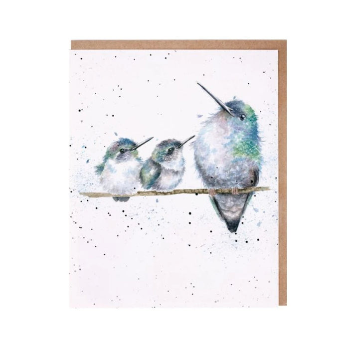 An illustration of three hummingbirds resting on a branch, depicted on a decorative card.