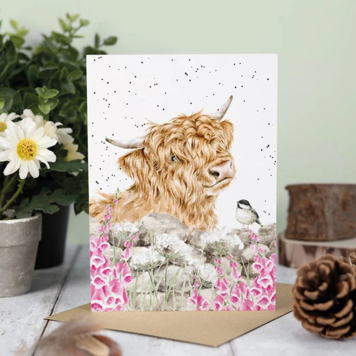 An illustrated card displaying a cow alongside a bird, emphasizing a playful rural theme.
