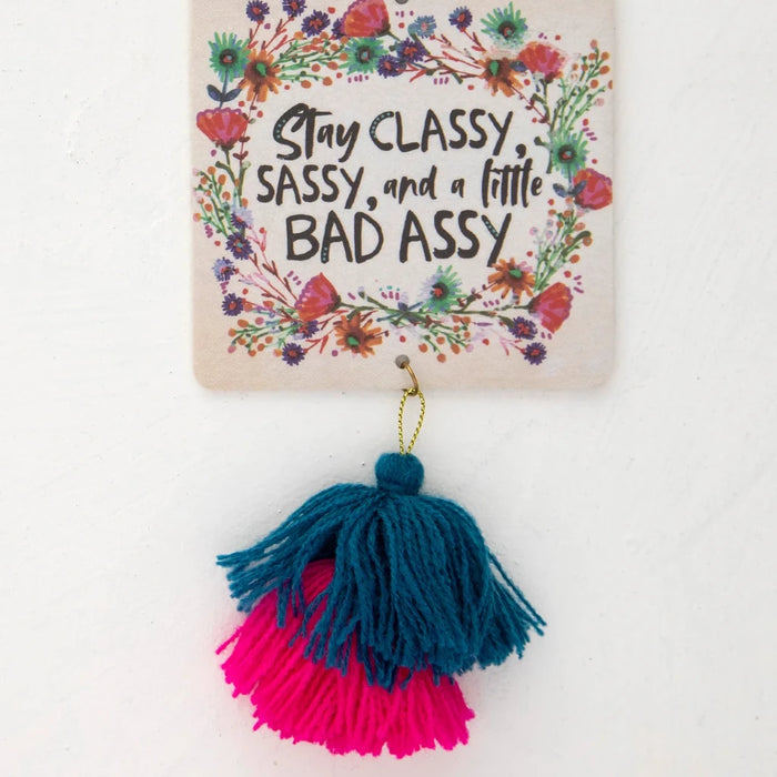 Classy & Sassy scented car air freshener hanging as a stylish vehicle accessory.