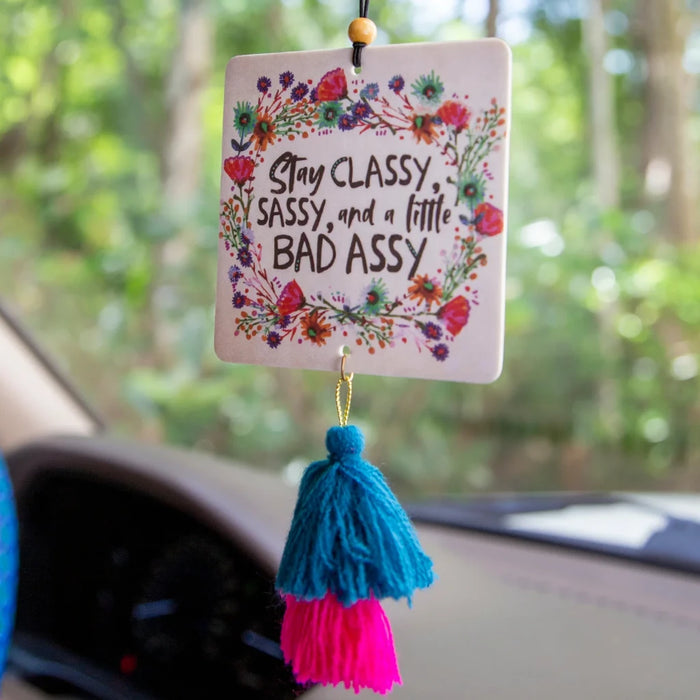 Classy & Sassy scented car air freshener hanging as a stylish vehicle accessory.