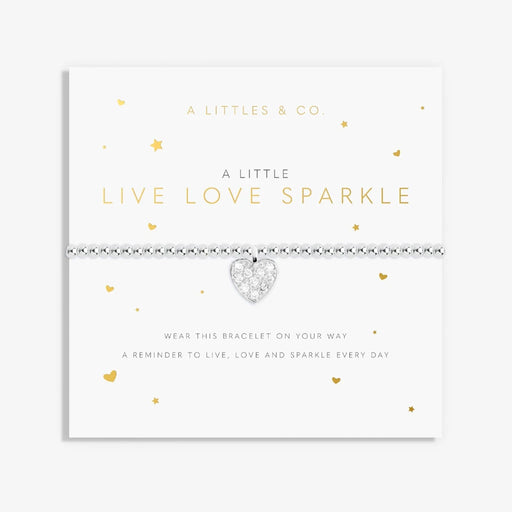 A close-up of a bracelet featuring the words "live," "love," and "sparkle" in a charming design.