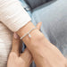 This A Littles & Co A Little Guardian Angel Bracelet offers a meaningful symbol of comfort, protection, and love.