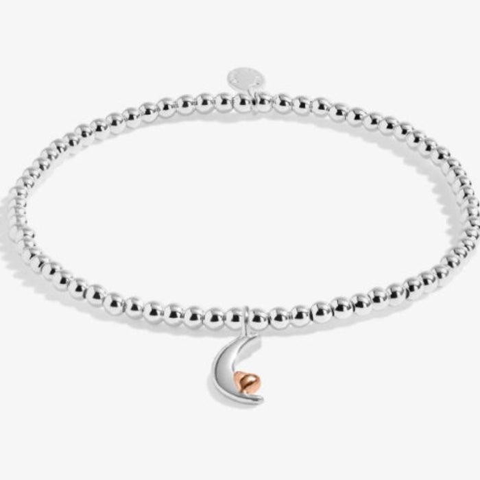 This A Littles & Co A Little “Love You To The Moon & Back” Bracelet celebrates a love that feels endless and unforgettable.