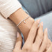 This A Littles & Co A Little “Love You To The Moon & Back” Bracelet celebrates a love that feels endless and unforgettable.