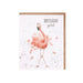 A birthday card featuring a colorful pink flamingo against a cheerful background.