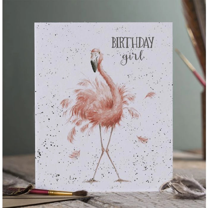 A vibrant birthday card adorned with a pink flamingo, celebrating a special occasion.