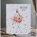 A vibrant birthday card adorned with a pink flamingo, celebrating a special occasion.