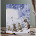 A card depicting four dogs and a cat perched on a hillside, enjoying a sunny day in a serene outdoor setting.
