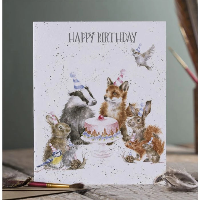  A festive birthday card showcasing a gathering of playful animals and birds in a joyful scene.
