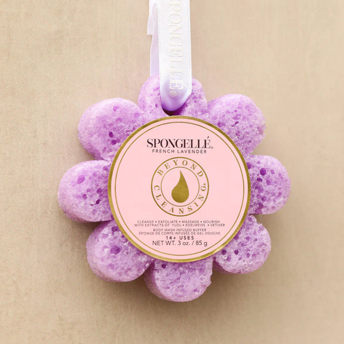 Purple bath sponge buffer with 'Spongellé' branding on a white background