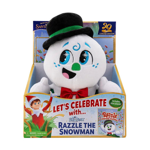 Plush toy resembling a snowman with a top hat and bow tie, in front of its packaging.