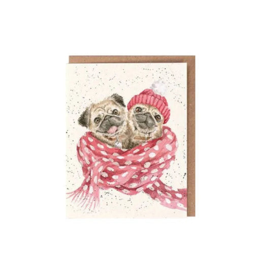 Wrendale “Snug as a Pug” enclosure card featuring two illustrated pugs with a recycled kraft envelope