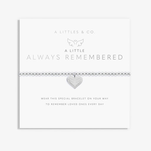 A Littles & Co Always Remembered bracelet displayed on sentiment card featuring silver heart charm with angel wings