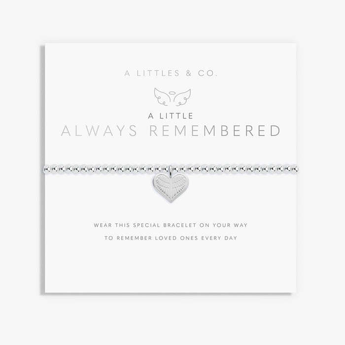 A Littles & Co Always Remembered bracelet displayed on sentiment card featuring silver heart charm with angel wings