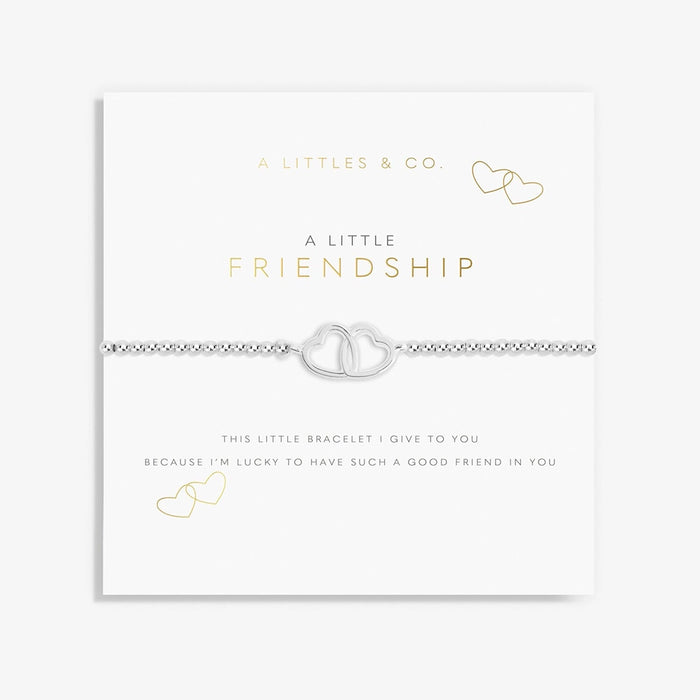 A Littles & Co. A Little Friendship bracelet displayed on keepsake card with silver interlinked heart charm and sentimental message
