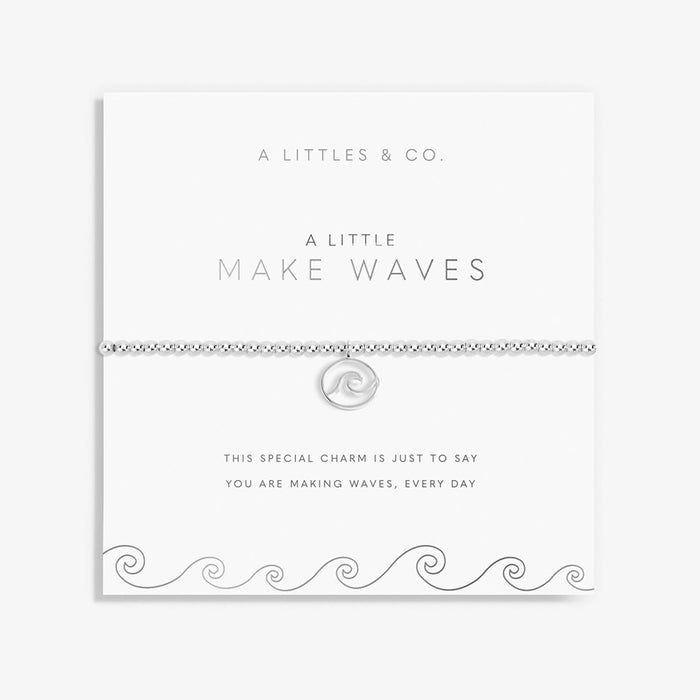 A Littles & Co. A Little Make Waves silver beaded bracelet displayed on sentiment card with wave charm