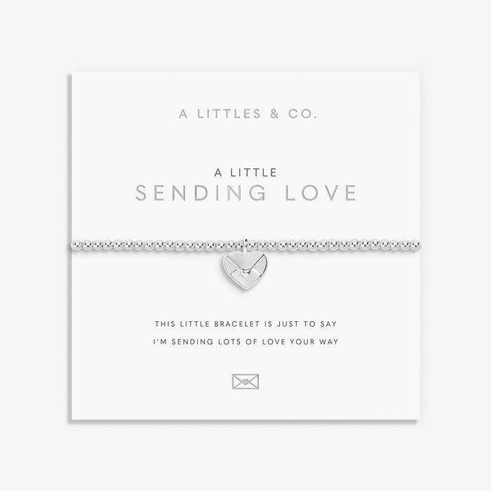 A Littles & Co. A Little Sending Love bracelet on sentiment card with silver heart envelope charm