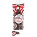 Bag of Abdallah Candies Dark Chocolate Peppermint Crunch with red-and-white bow and pieces of dark chocolate coated in crushed peppermint.