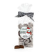 Bag of Abdallah Candies Double Dark Fudge Snowman Buttons coated in white nonpareils with a black-and-white gingham bow.