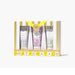 Three hand cream tubes adorned with floral designs, arranged together on a light background.