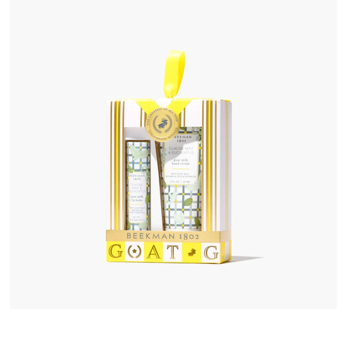 A white gift box adorned with a bright yellow ribbon, elegantly presented for a special occasion.