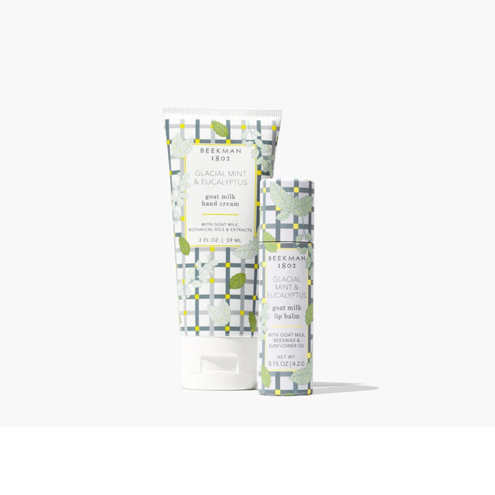 Lemon and lime scented body lotion and body wash from The Body Shop, shown side by side on a neutral surface.