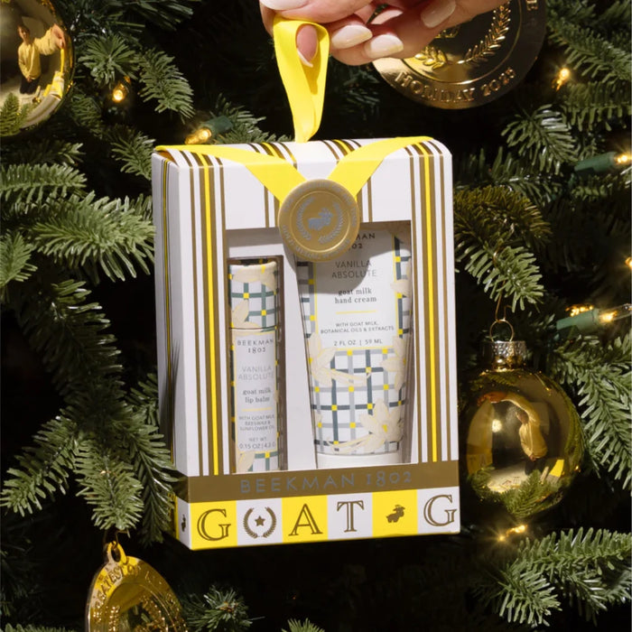 A white box with a yellow ribbon, beautifully wrapped for a thoughtful present.
