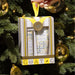 A white box with a yellow ribbon, beautifully wrapped for a thoughtful present.