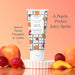 Hand cream tube displayed with vibrant oranges and berries, emphasizing a fruity scent.